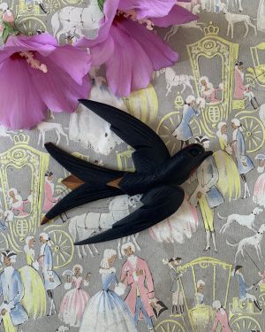 Ancienne hirondelle en bois