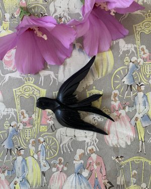 Ancienne hirondelle en bois