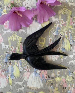 Ancienne hirondelle en bois