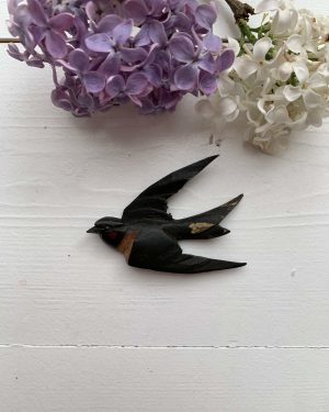 Ancienne hirondelle en bois