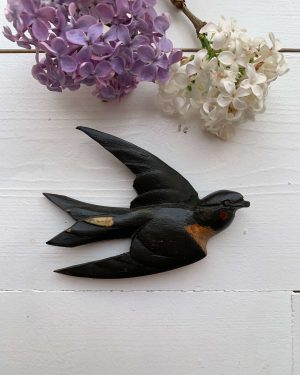 Ancienne hirondelle en bois
